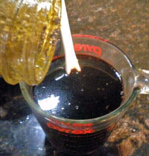 How to Make Elderberry Syrup for Flu Prevention making homemade elderberry syrup recipe How to Make Elderberry Syrup for Flu Prevention