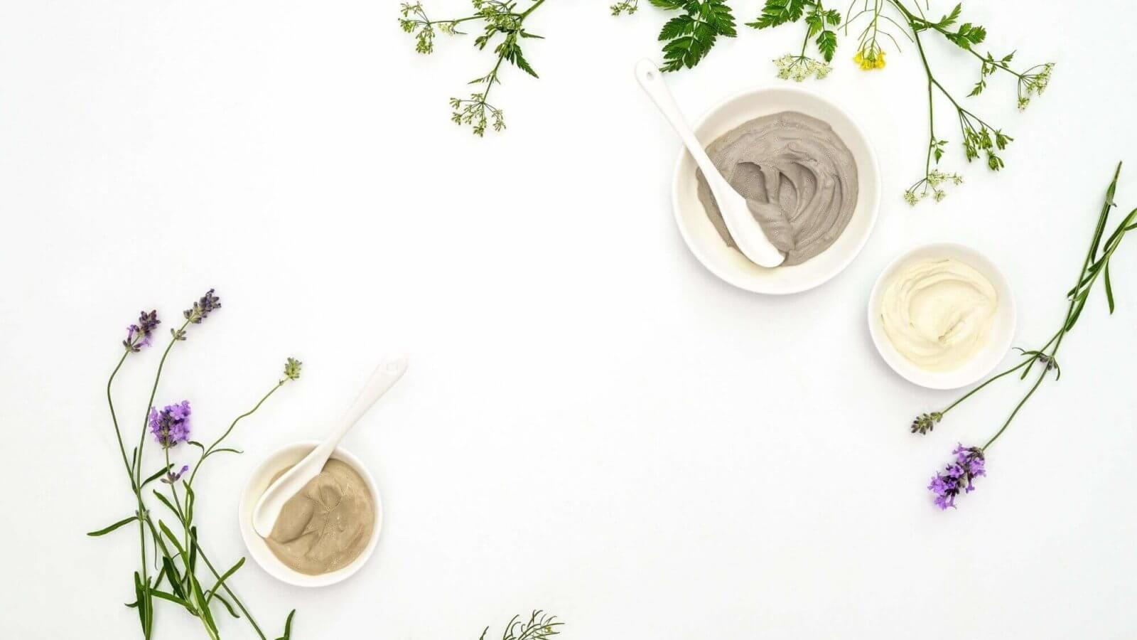 White table with flowers and creams